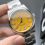 Rolex Oyster Perpetual 41 mm Oyster Trapeze Bezel Yellow Dial - Image 3