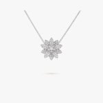 Van Cleef and Arpels Lotus clip pendant medium model